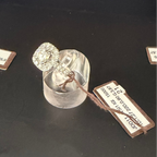 Solitaire ring with diamond halo