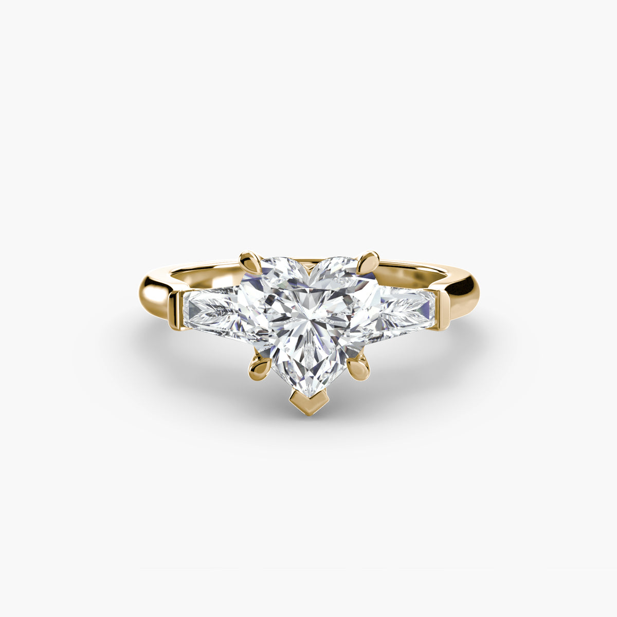 Anello Trilogy con Baguette Laterali