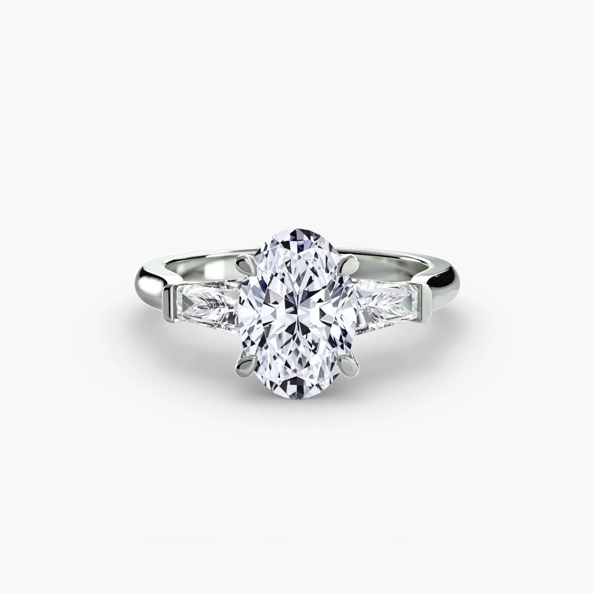 Anello Trilogy con Baguette Laterali