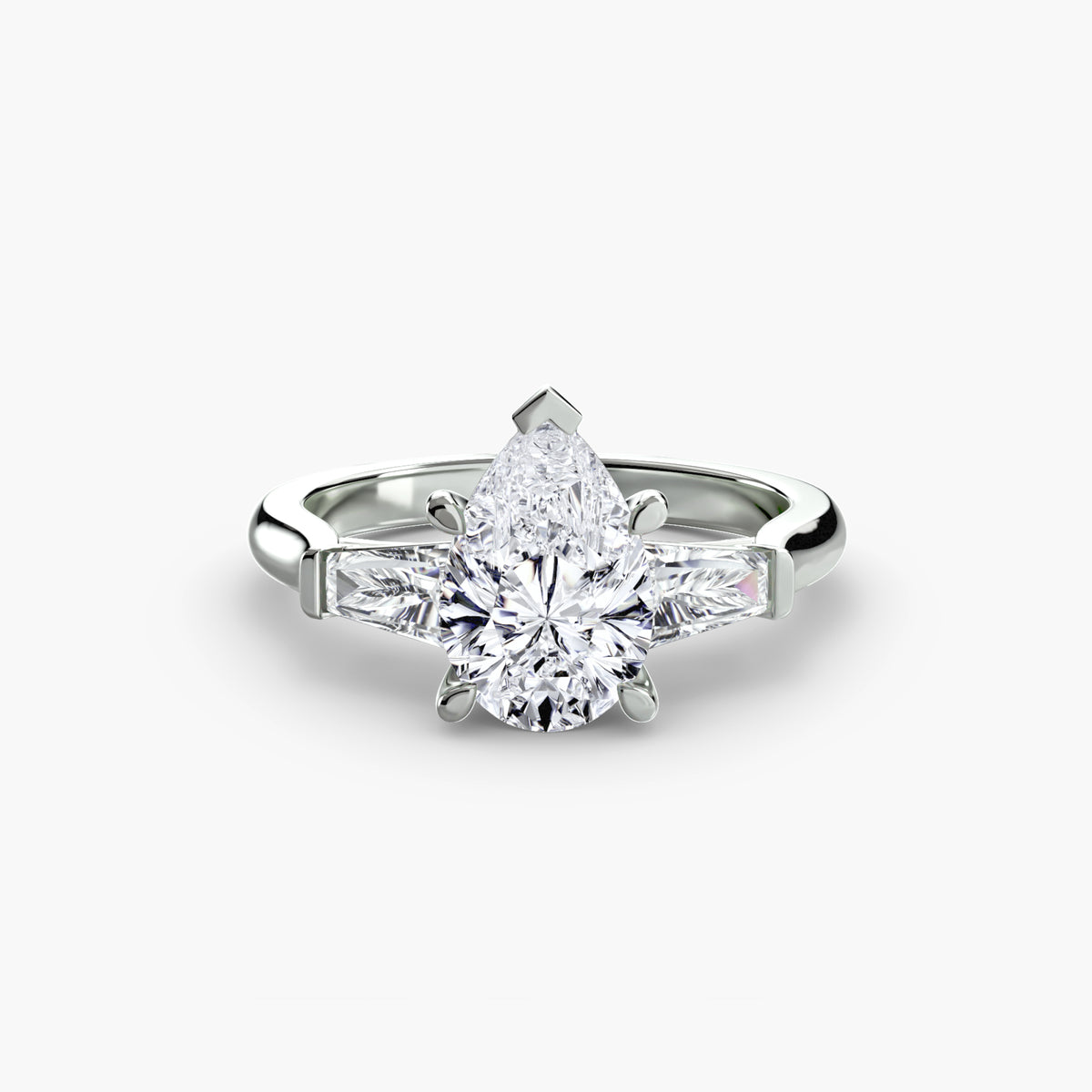 Anello Trilogy con Baguette Laterali
