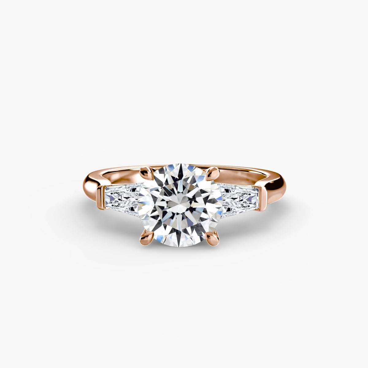 Anello Trilogy con Baguette Laterali