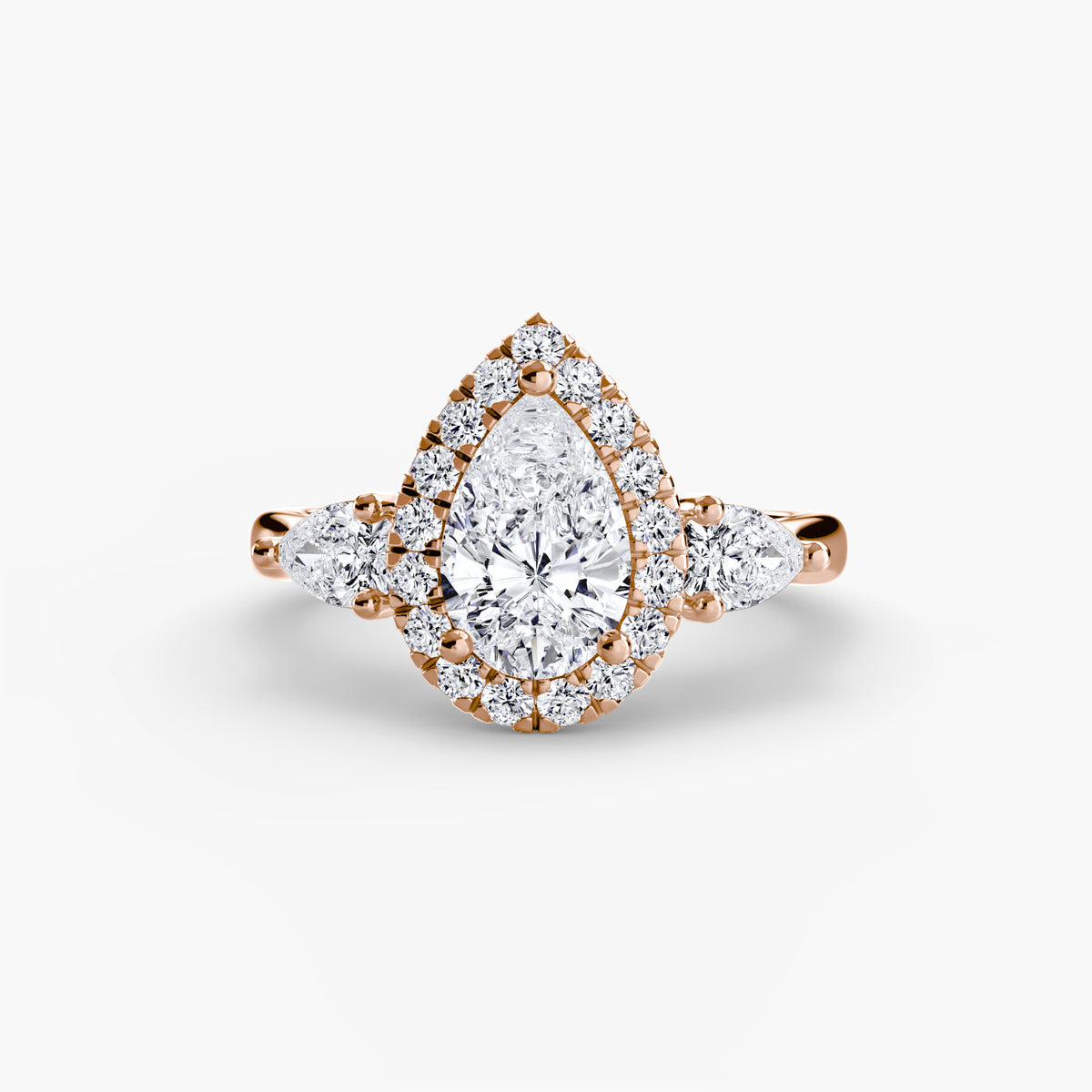 Trilogy ring with halo