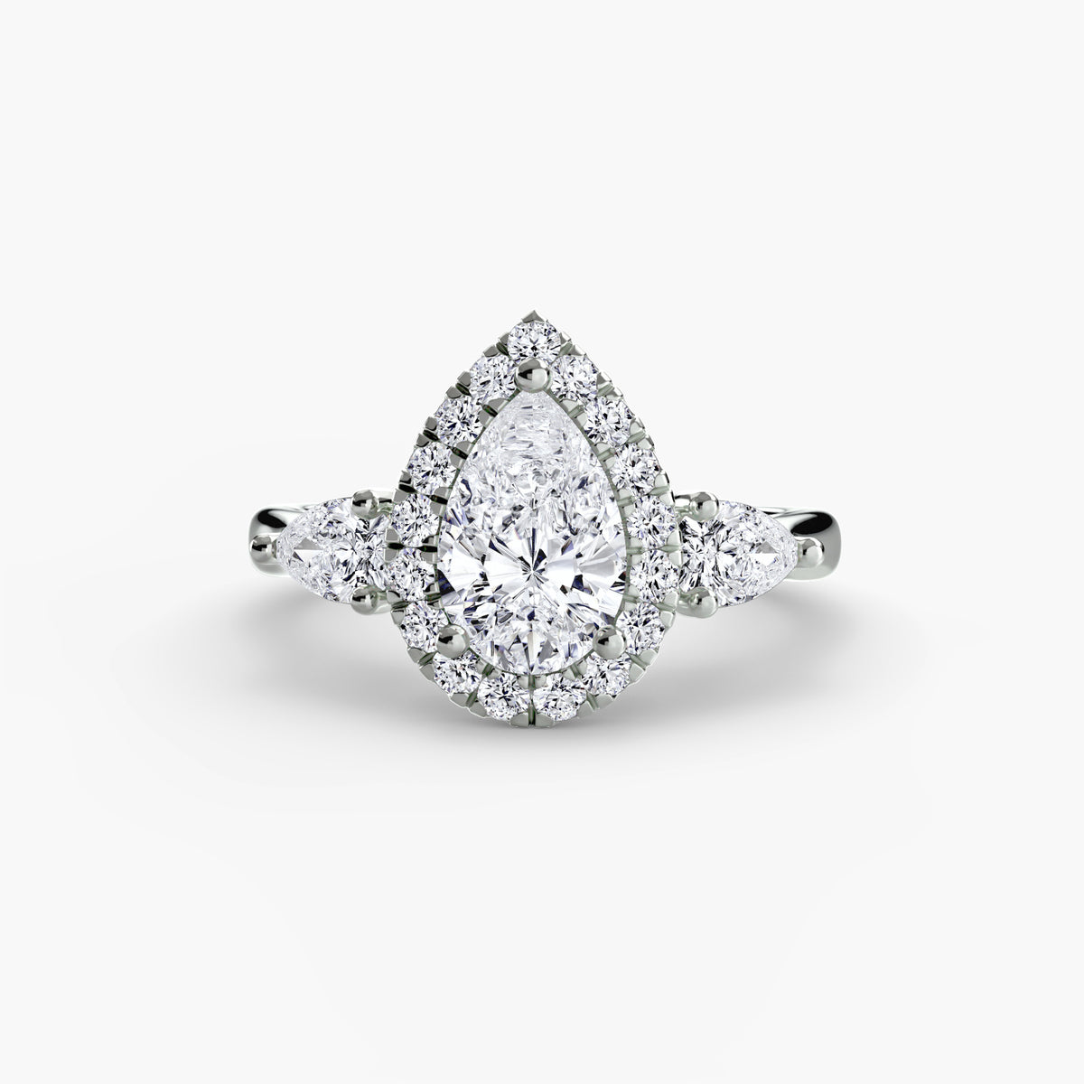 Trilogy ring with halo