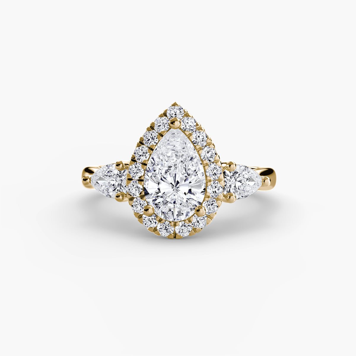 Trilogy ring with halo